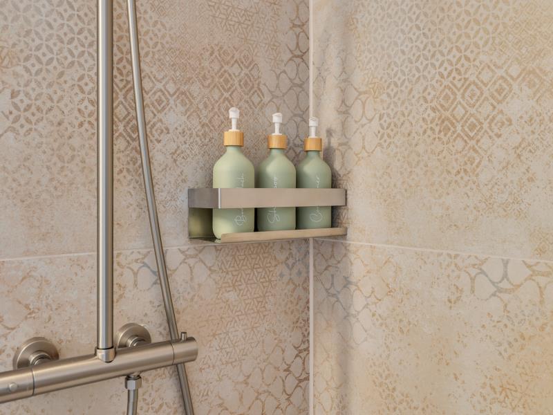 Detail shot of sage-green amenity bottles in the shower