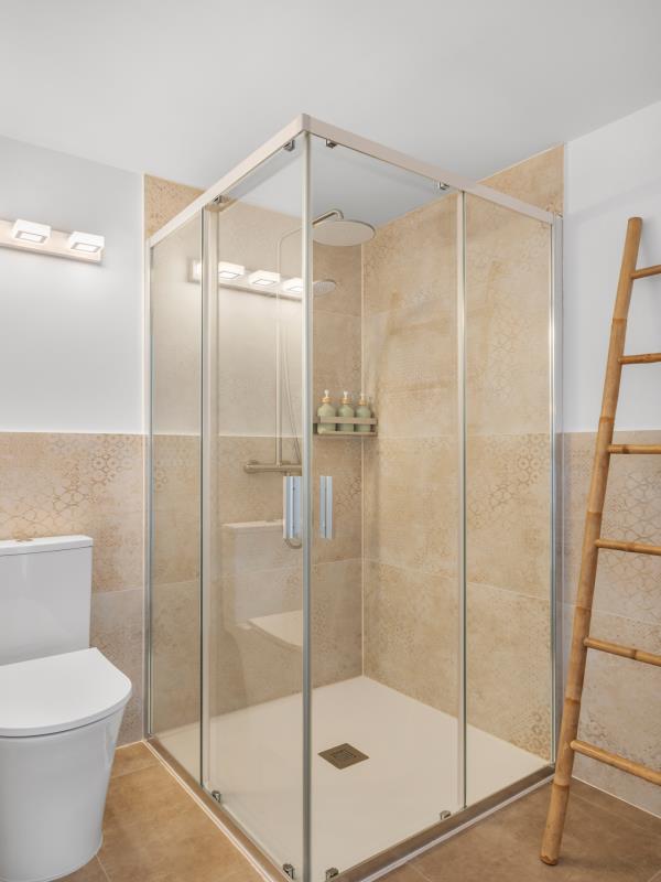 En-suite bathroom for room 2 with corner walk-in shower